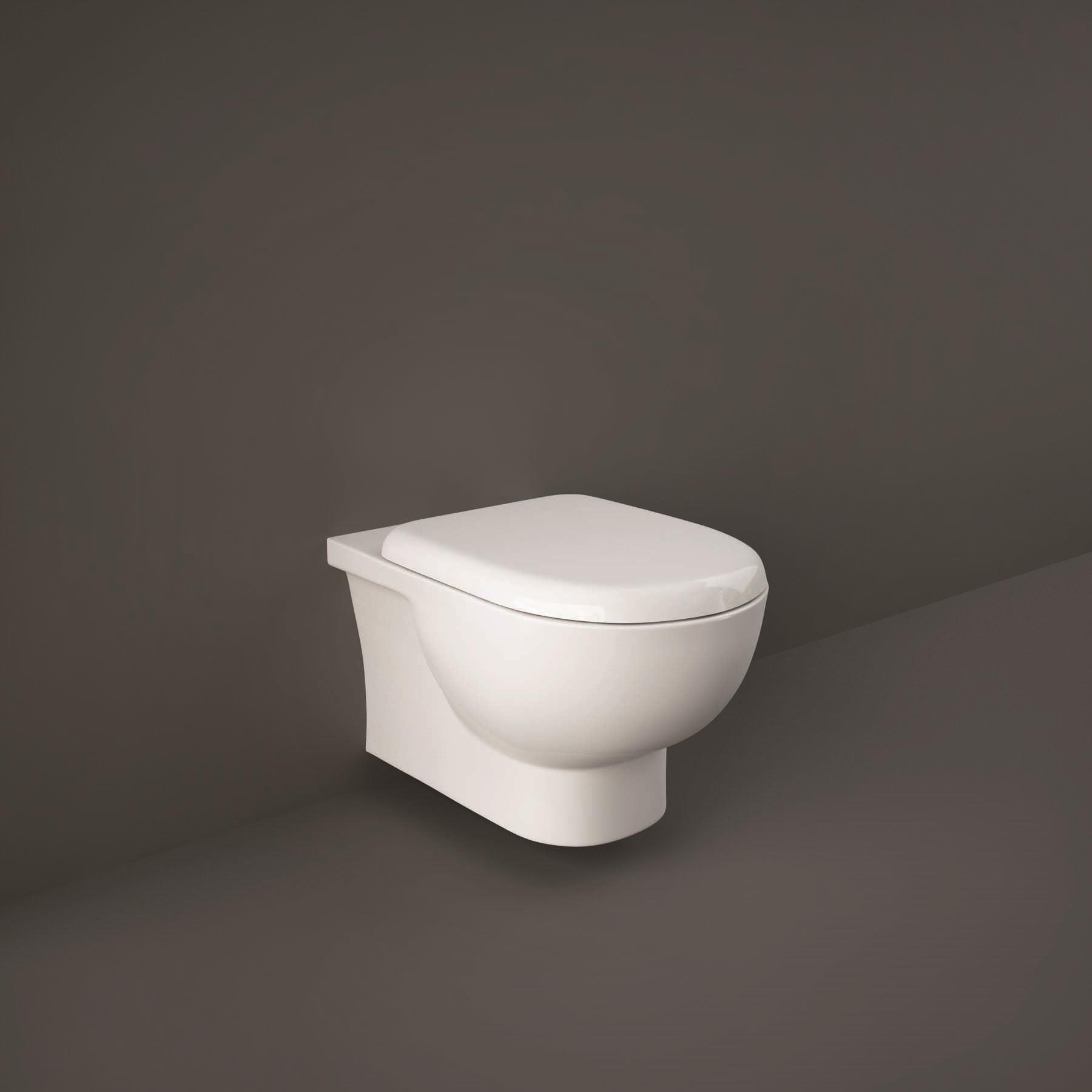 Wall Hung Toilet With Soft Close Seat On Brown Background